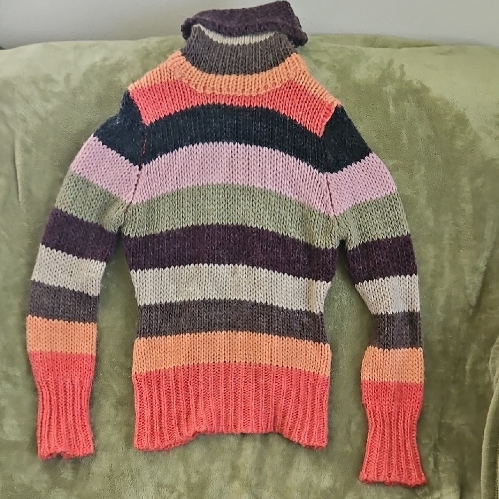 Vibrant Pink and Orange Turtleneck Sweater with Ribbed Texture